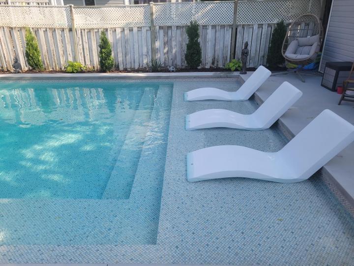 piscine sun ledge toile turquoise